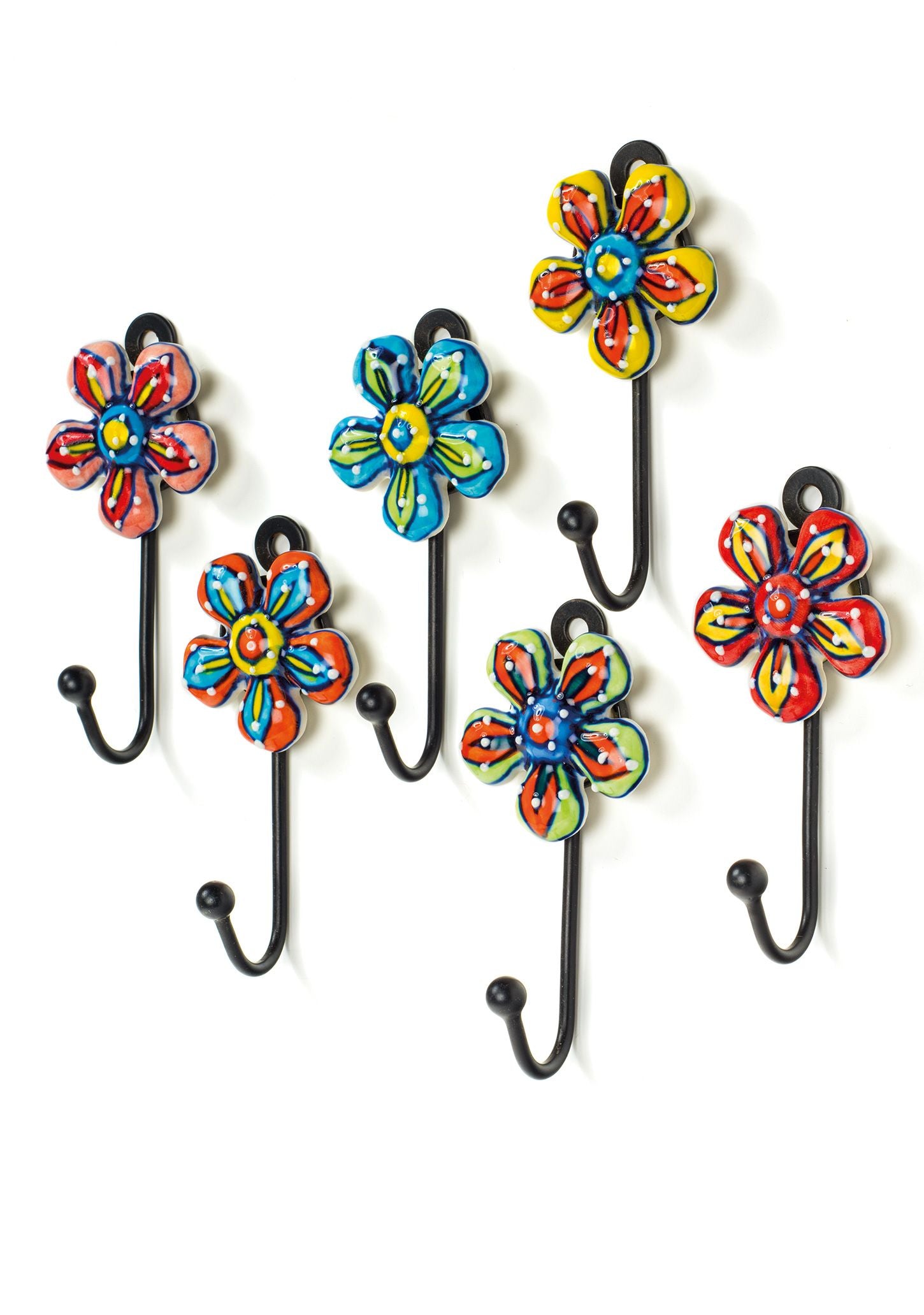 decorative ceramic flower wall hooks handmade by artisan ethical and fair trade gift. Flower hooks in different colors like green, blue, yellow, red, pink and orange