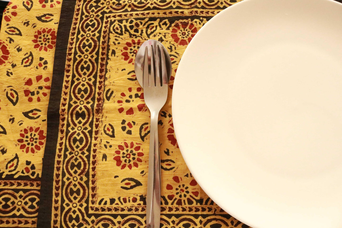 Yellow saffron hand-dyed block print table cover with 8 matching napkins - an eco-friendly and ethically made dining ensemble by Ethimaart.