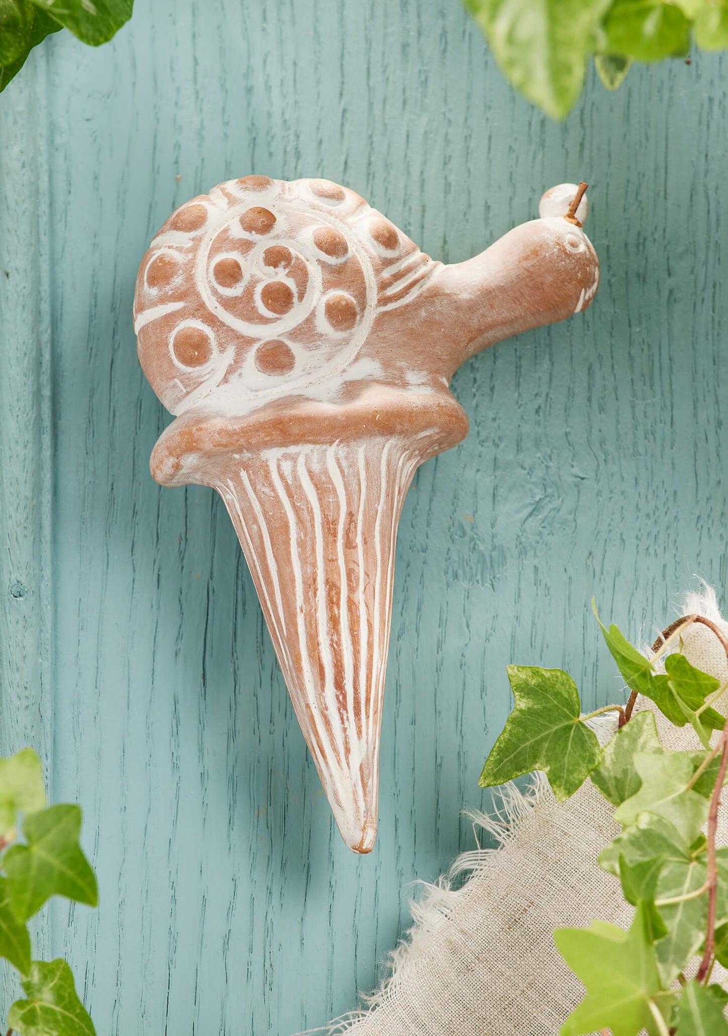 Enhance your plant care routine with our Sustainable Terracotta Snail Water Spike. Crafted with care by artisans, this eco-friendly garden accessory ensures optimal plant health while adding whimsical charm to your space. Perfect for housewarming gifts or self-care. Explore now!