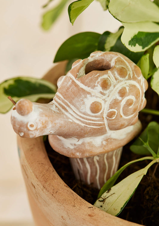 Enhance your plant care routine with our Sustainable Terracotta Snail Water Spike. Crafted with care by artisans, this eco-friendly garden accessory ensures optimal plant health while adding whimsical charm to your space. Perfect for housewarming gifts or self-care. Explore now!