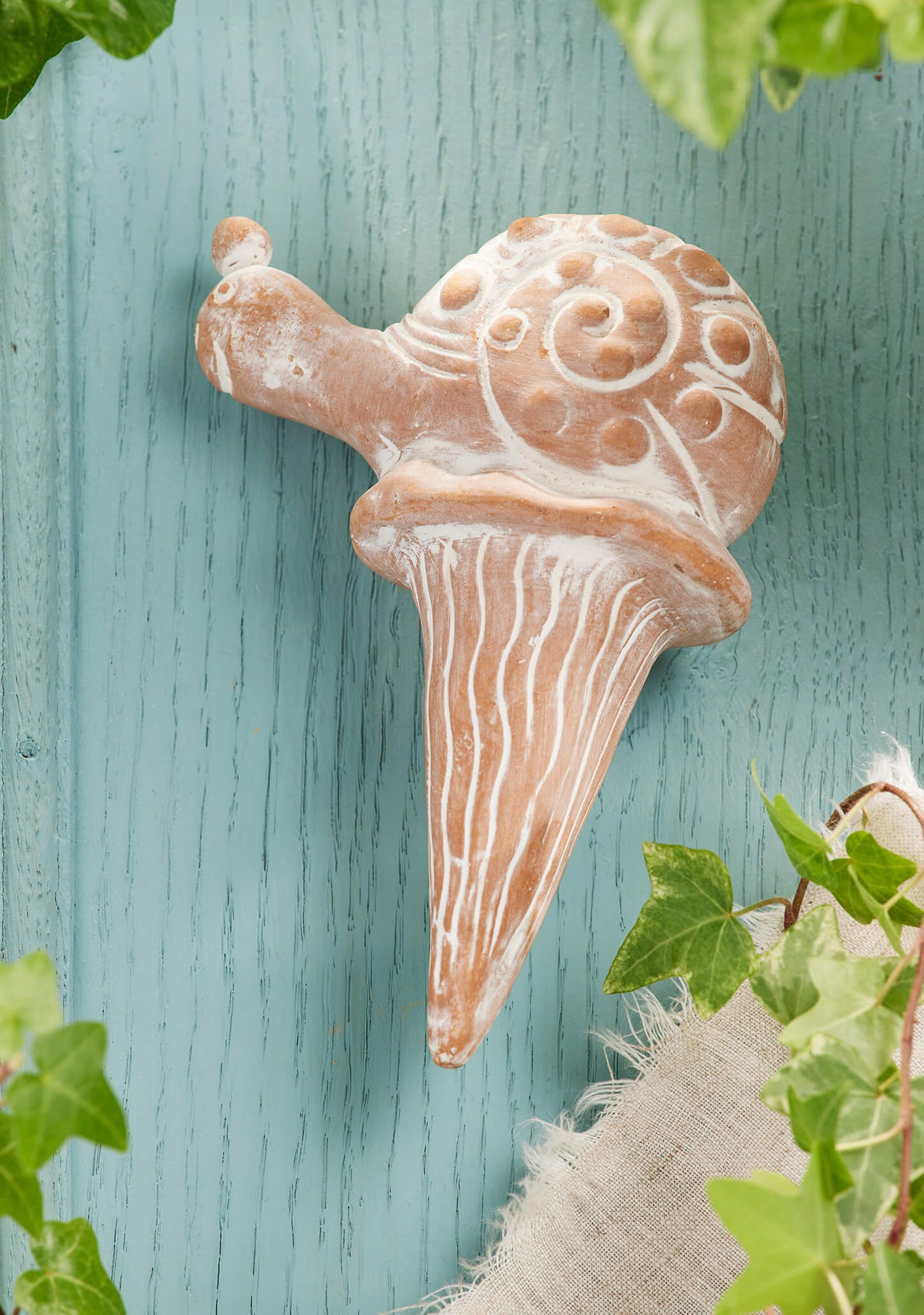 Enhance your plant care routine with our Sustainable Terracotta Snail Water Spike. Crafted with care by artisans, this eco-friendly garden accessory ensures optimal plant health while adding whimsical charm to your space. Perfect for housewarming gifts or self-care. Explore now!