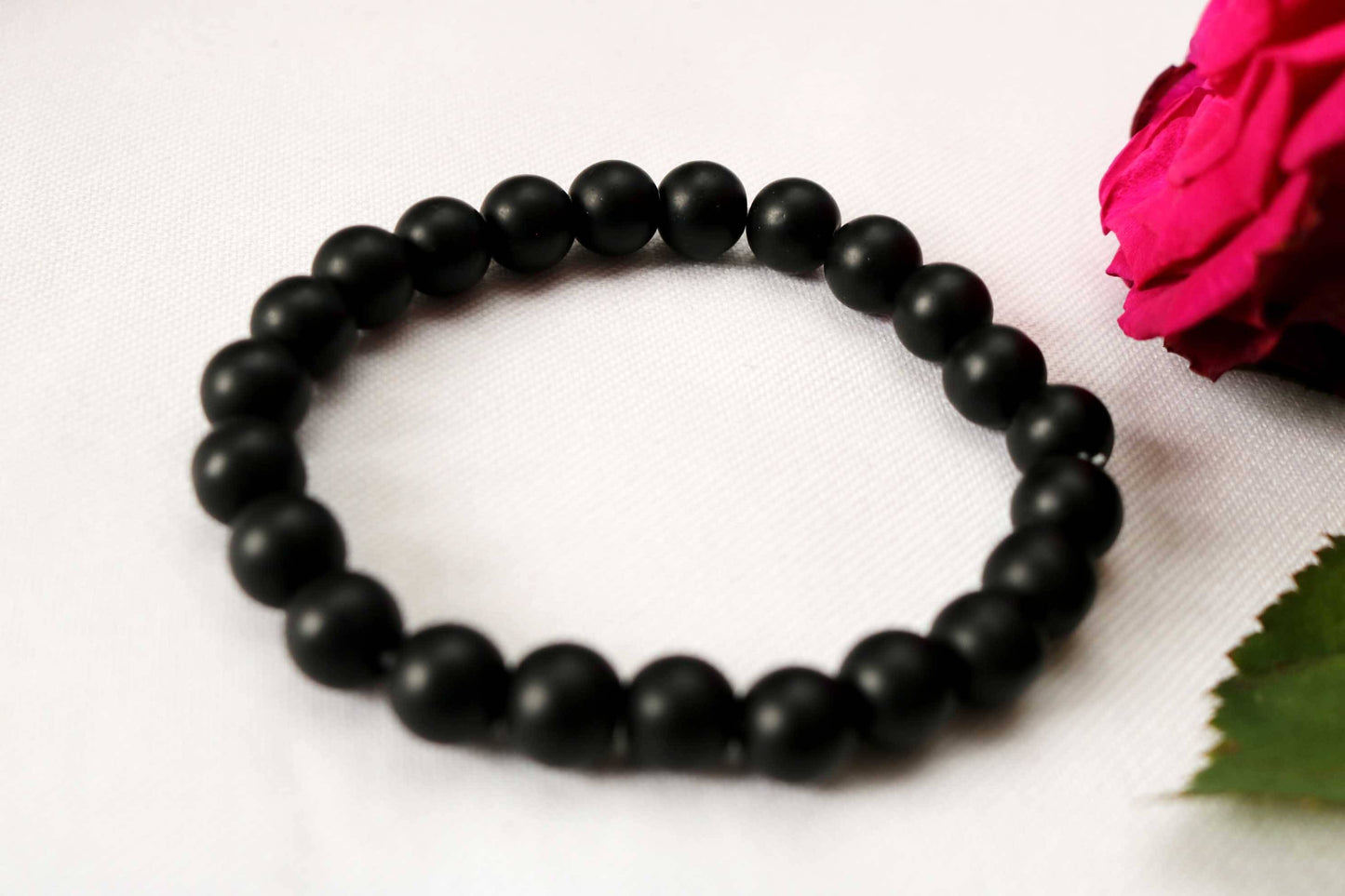 Discover sophistication with our 8mm Men Black Turquoise Gemstone Bracelet, a perfect gift for him. Handcrafted with care, this versatile piece blends rugged charm with timeless elegance. Ideal for special occasions or daily wear, it's a stylish addition to any ensemble. Shop now at Ethimaart.