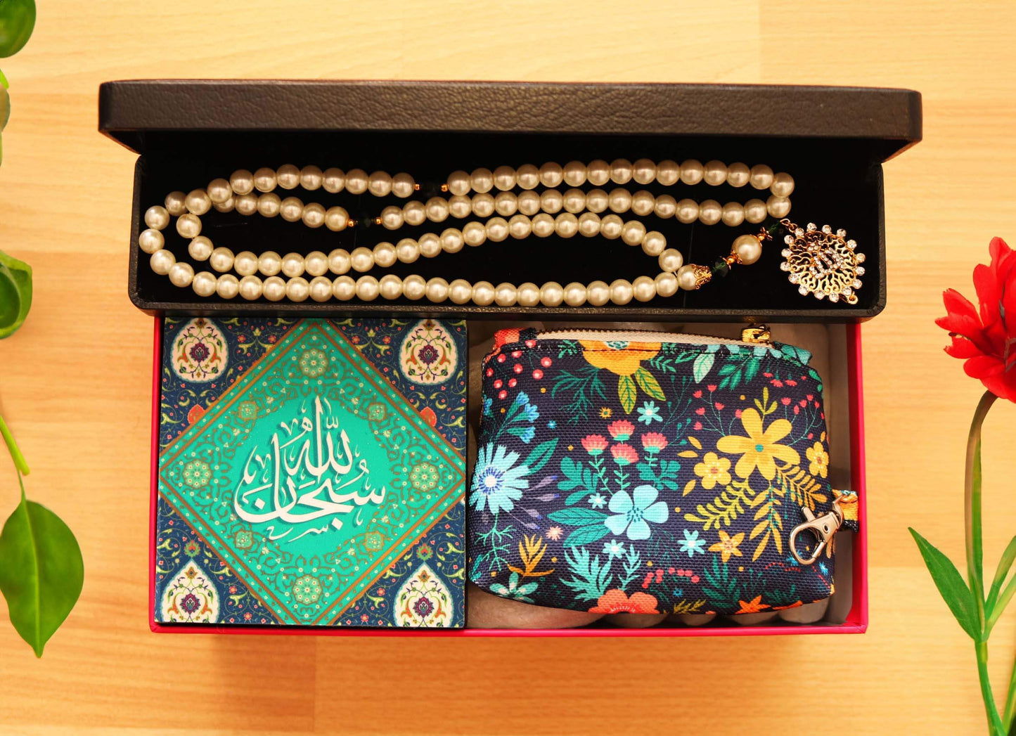Sustainable Ramadan Gift Set | Ethical Corporate Hamper. contains shell pearl handmade tasbeeh muslim arabic rosary with gold plated Allah locket. Handmade floral coin purse with clasp and 4 by 4 inch glittered wall plaque that says SubhanAllahSustainable Ramadan Gift Set | Ethical Corporate Hamper