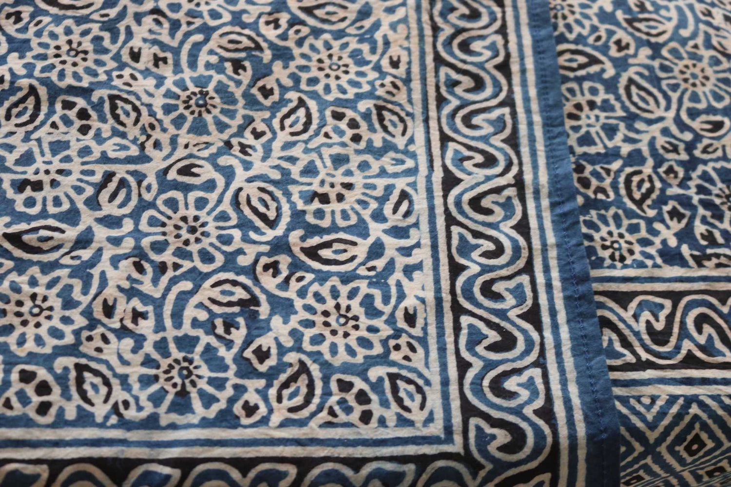 natural dye indigo dye table cloth with hand block print floral motifs by artisans in Pakistan on 100% cotton fabric for large and small tables for festive season