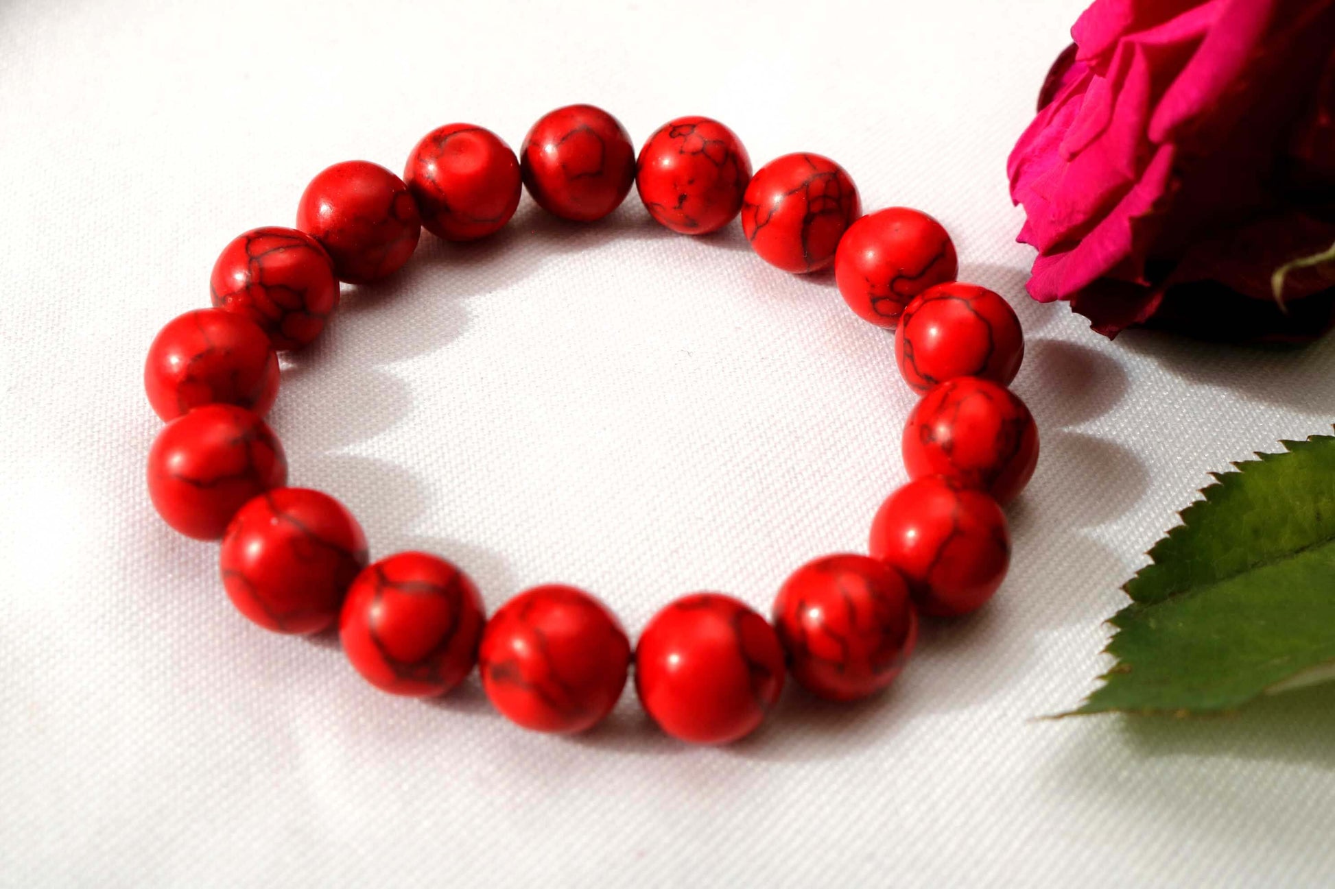 Beaded Bracelet : Discover sophistication with our Men Crimson Bracelet featuring 12 mm Red Turquoise Gemstone. Handcrafted for versatility, it's a unique boho-inspired bracelet. Perfect as a Valentine's Day gift or unique accessory for any occasion. Adjustable for comfort and style. Shop now at Ethimaart.