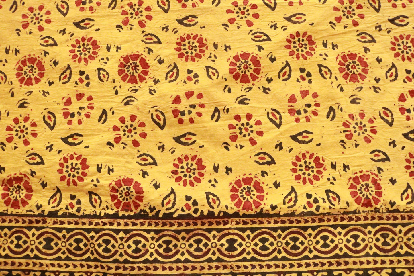 Yellow saffron hand-dyed block print table cover with 8 matching napkins - an eco-friendly and ethically made dining ensemble by Ethimaart.