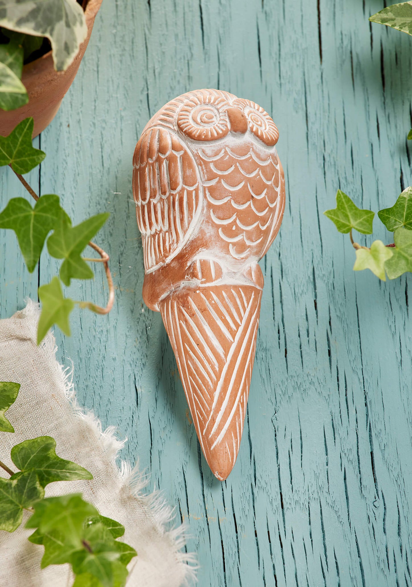 Elevate your plant care with our charming Sustainable Terracotta Owl Plant Water Spike. Crafted by artisans, this self-watering stake ensures optimal plant health while adding a touch of whimsy to your garden. Perfect for housewarming gifts or self-care, it's a thoughtful addition to any green space. Explore now!