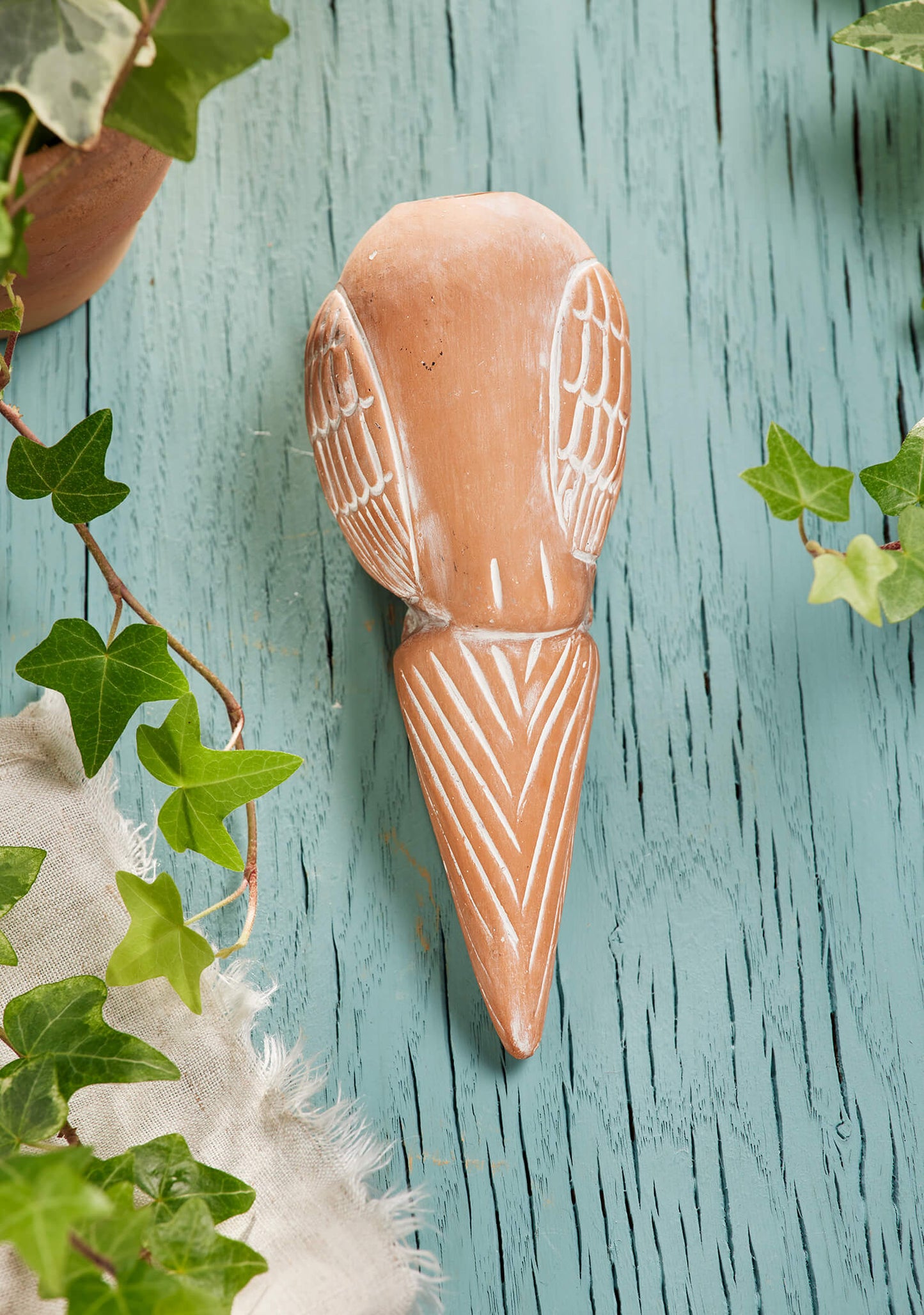 Elevate your plant care with our charming Sustainable Terracotta Owl Plant Water Spike. Crafted by artisans, this self-watering stake ensures optimal plant health while adding a touch of whimsy to your garden. Perfect for housewarming gifts or self-care, it's a thoughtful addition to any green space. Explore now!