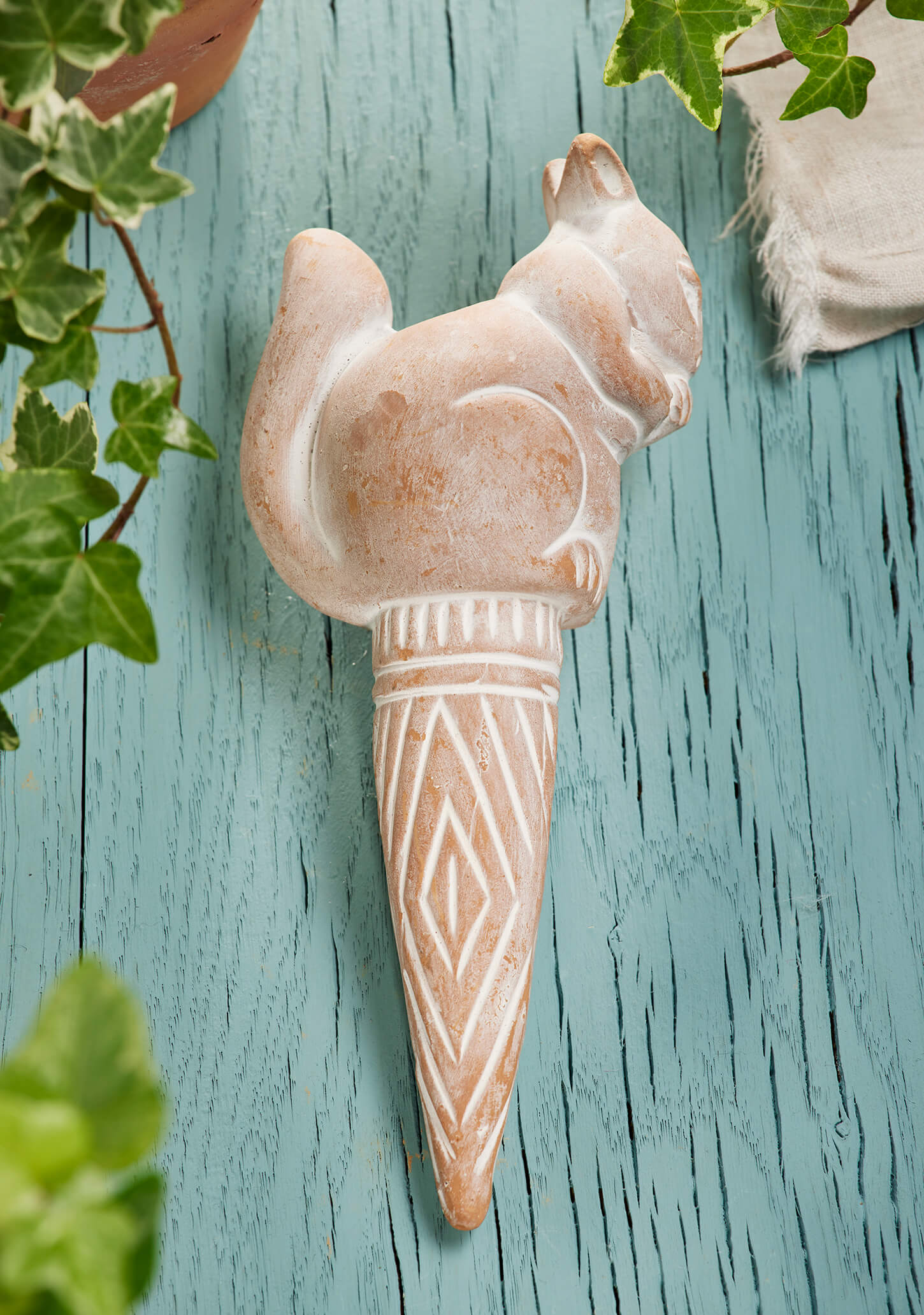 Elevate your plant care with our charming Sustainable Terracotta Squirrel Water Spike. Crafted with care by artisans, this eco-friendly garden accessory ensures optimal plant health while adding whimsical charm to your space. Perfect for housewarming gifts or self-care, it's a thoughtful addition to any green space. Explore now.