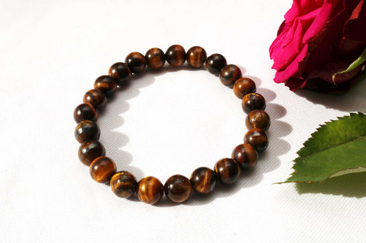 Close-up of 8mm Men's Tiger Eye Gemstone Bracelet - Handmade jewelry, perfect for men or women, featuring Tiger Eye gemstones on a string bracelet. Ideal as groomsmen gifts, wedding gifts, or a thoughtful present for Dad. Versatile and stylish, suitable for any occasion