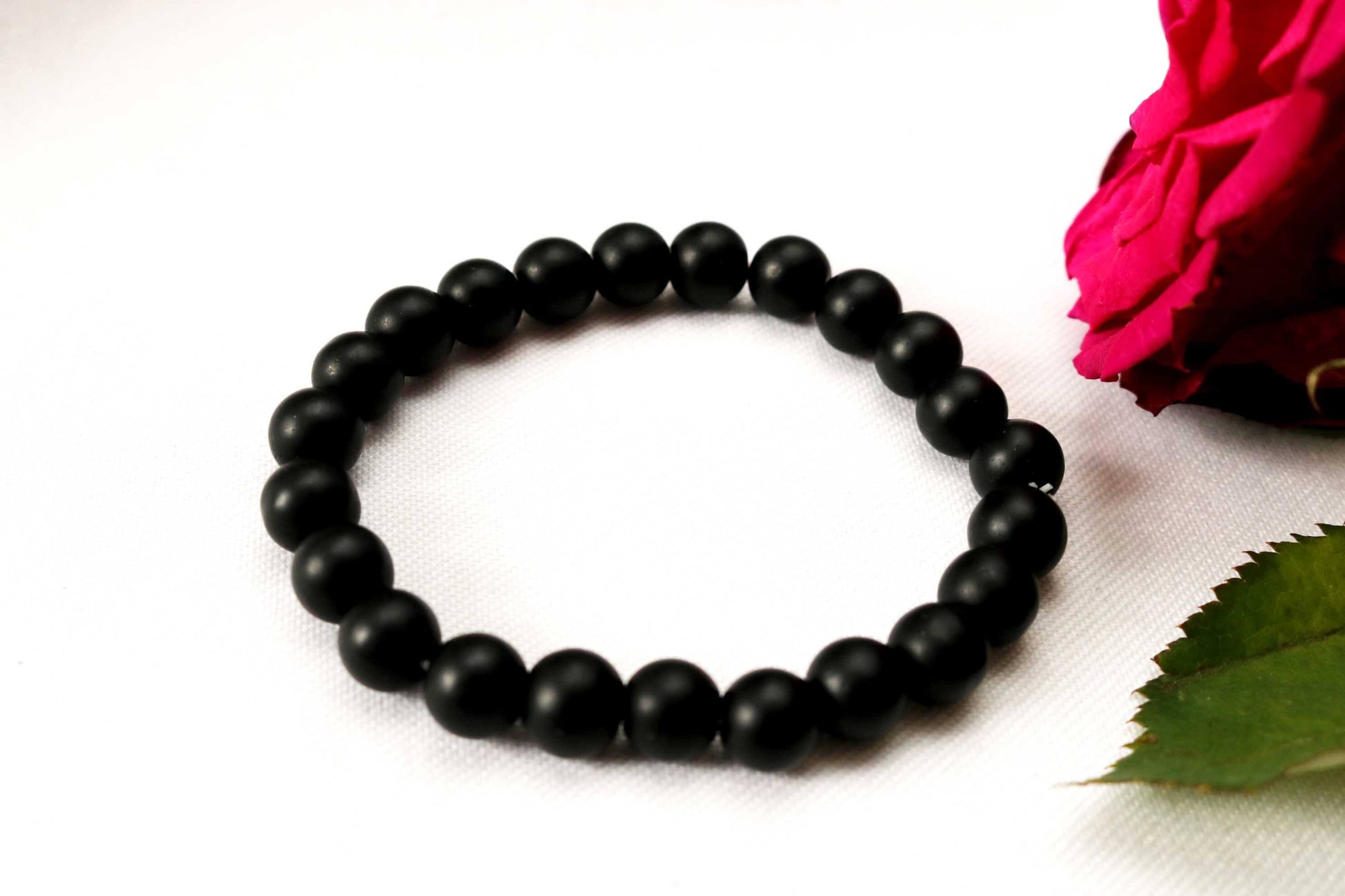 Discover sophistication with our 8mm Men Black Turquoise Gemstone Bracelet, a perfect gift for him. Handcrafted with care, this versatile piece blends rugged charm with timeless elegance. Ideal for special occasions or daily wear, it's a stylish addition to any ensemble. Shop now at Ethimaart.