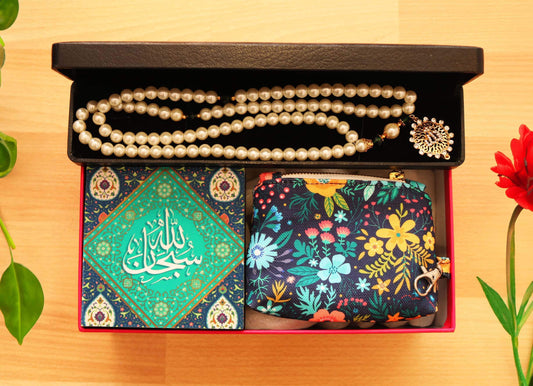 Sustainable Ramadan Gift Set | Ethical Corporate Hamper. contains shell pearl handmade tasbeeh muslim arabic rosary with gold plated Allah locket. Handmade floral coin purse with clasp and 4 by 4 inch glittered wall plaque that says SubhanAllah